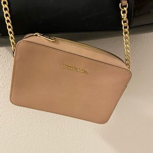 I am selling my michael kors cross- body bag